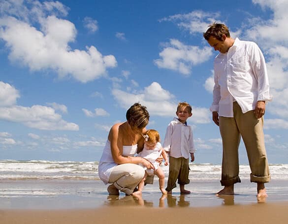Family on the beach planning for the future